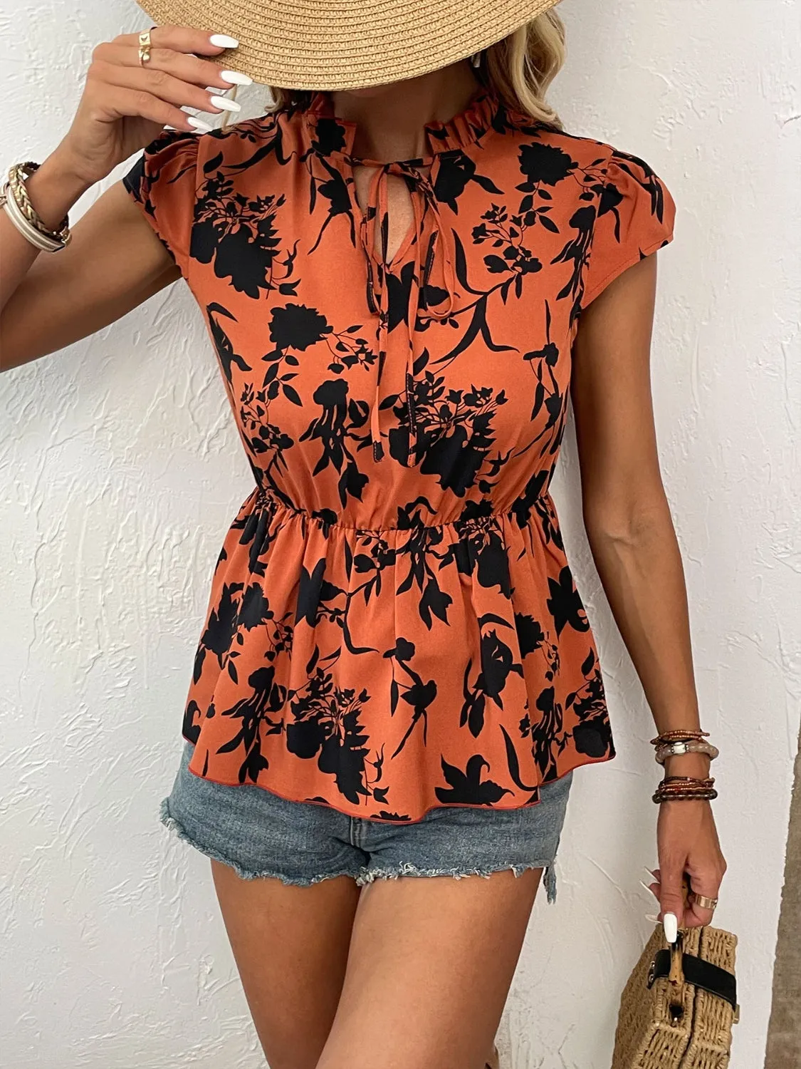 Shiny Printed Tie Neck Cap Sleeve Blouse